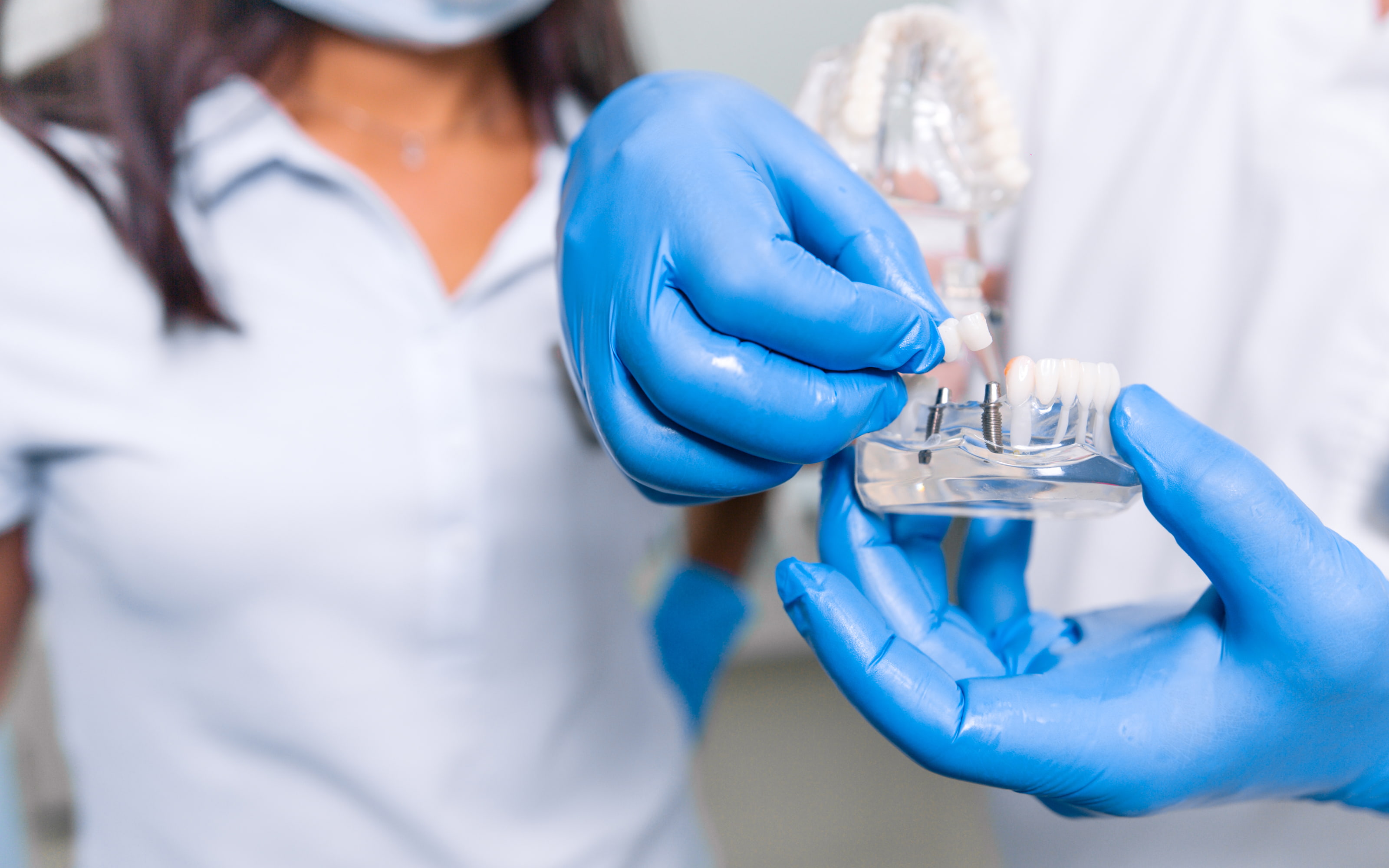 Benefits of dental implants including natural appearance, jawbone preservation, and long-lasting stability.