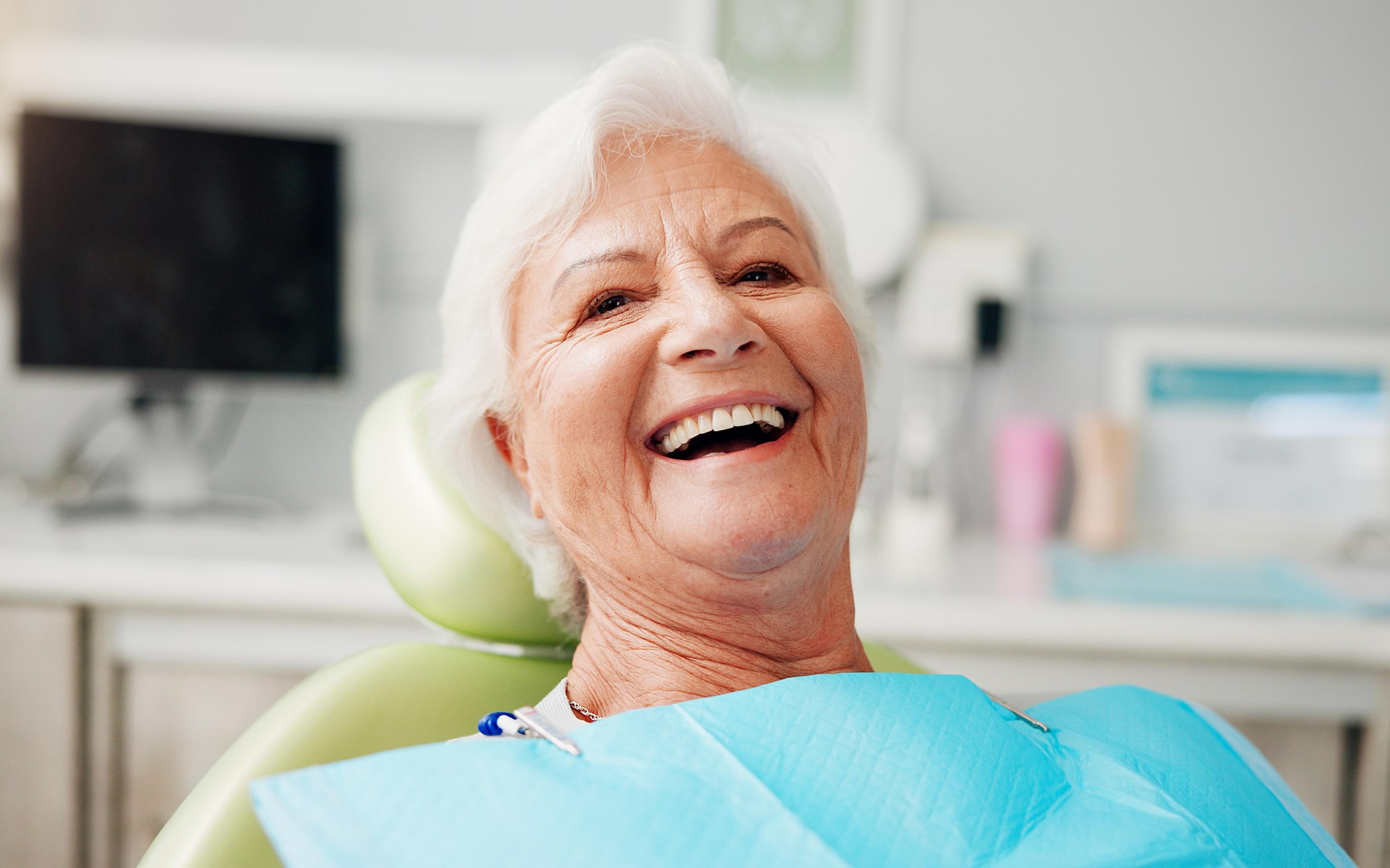 Dental implants providing long-term benefits such as bone preservation, improved speech, and lasting durability.