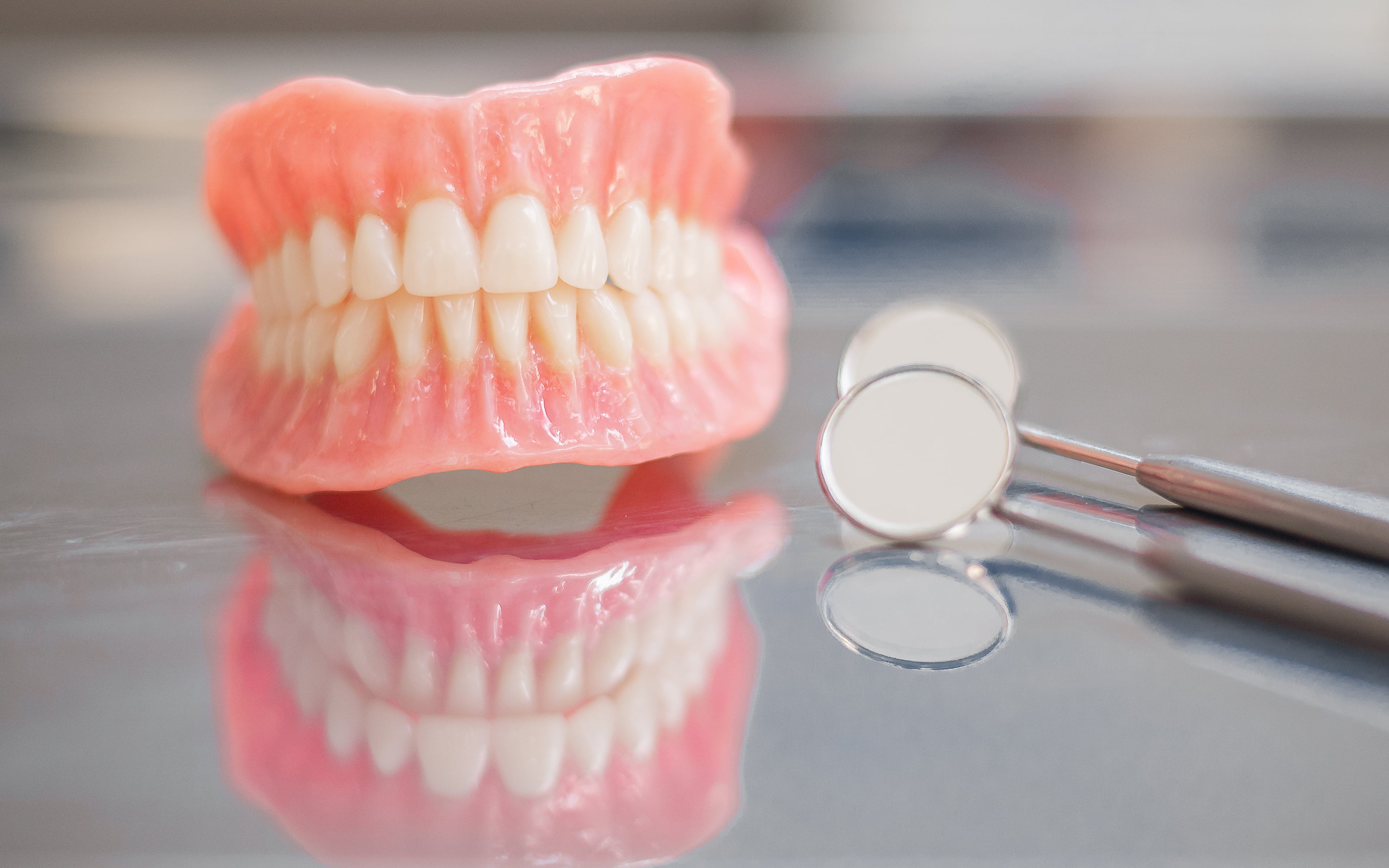 What is permanent teeth replacement